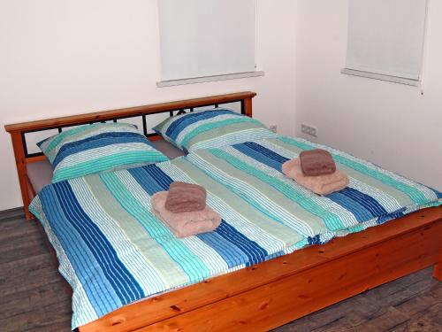 Tempat tidur dalam kamar di Ferienwohnung Teltow