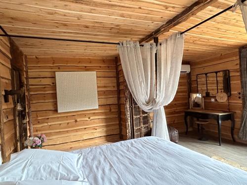 Postel nebo postele na pokoji v ubytování Bastide De Mazan
