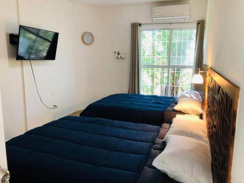 Un pat sau paturi într-o cameră la Casa Fragata 24 #piscina#Wifi#jacuzzi#