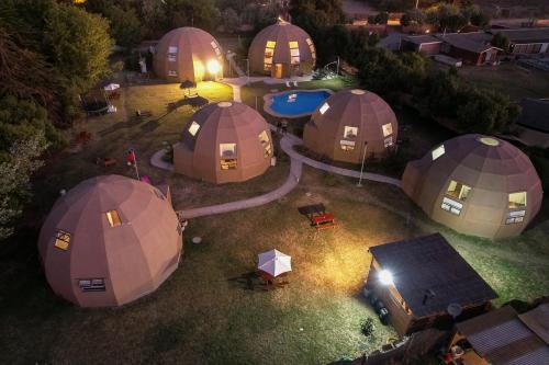 an aerial view of a group of domed tents at Domos Dream in La Serena