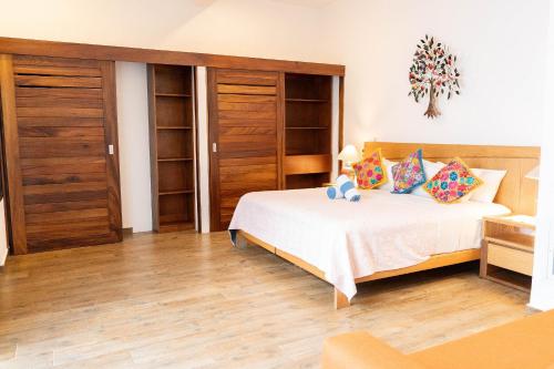 Ένα ή περισσότερα κρεβάτια σε δωμάτιο στο Refugio del Mar Luxury Hotel Boutique