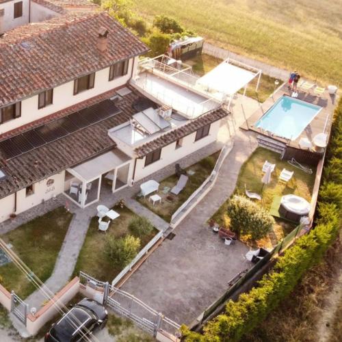 an aerial view of a house with a swimming pool at Il Marrondindo Bed & Breakfast in Galliano