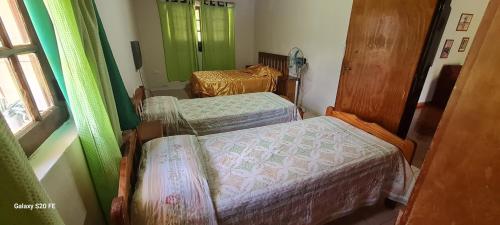Un pat sau paturi într-o cameră la Lo de Toty