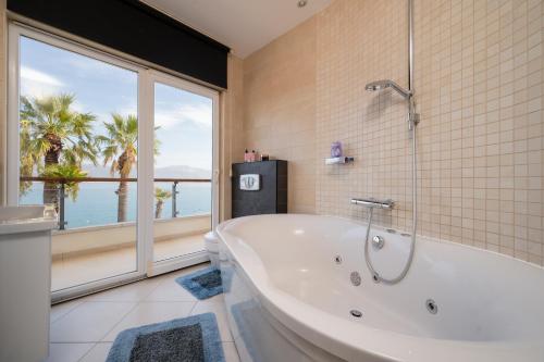 Villa Mirjana - exclusive beachfront 6 bedroom villa with pool