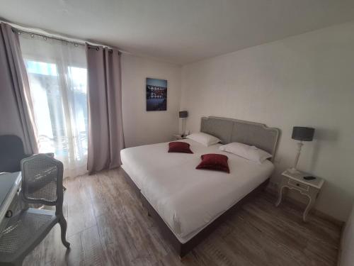 Un ou plusieurs lits dans un hébergement de l'établissement Best Western L'Orangerie