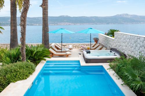Villa Mirjana - exclusive beachfront 6 bedroom villa with pool