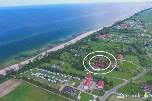 an aerial view of a park next to the ocean at Rodzinne Wczasy pod Gruszą in Gąski