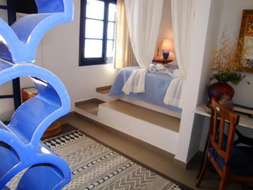 Ένα ή περισσότερα κρεβάτια σε δωμάτιο στο Big Blue Apartments 