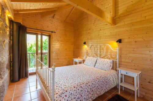 Ένα ή περισσότερα κρεβάτια σε δωμάτιο στο Quinta Casal De Vila Pouca