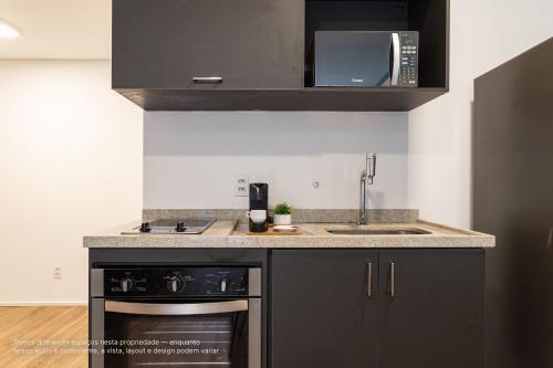 Cuisine ou kitchenette dans l'établissement Setin Downtown Genebra by Viva - Apartamentos completos na Bela Vista com piscina