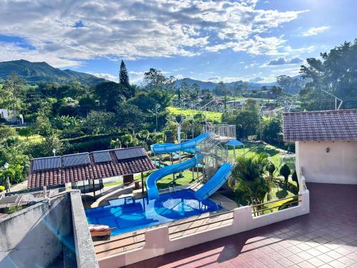 a view of a water park with a slide at Casa vacacional in Loja