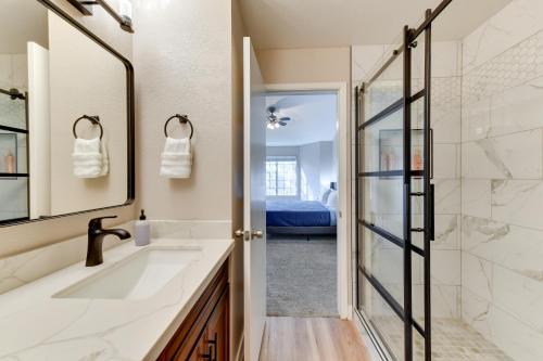 a bathroom with a sink and a shower at Pet-Friendly Condo with Pool about 7 Mi to Dtwn Chandler in Chandler