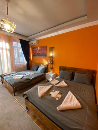Postel nebo postele na pokoji v ubytování Taksim Pandora hotel