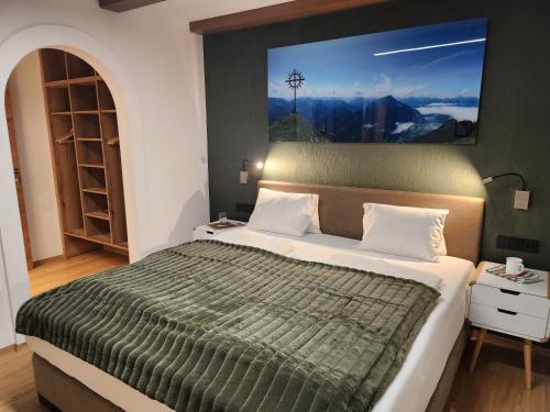 Ένα ή περισσότερα κρεβάτια σε δωμάτιο στο Appartements & Chalets Wiesenruh