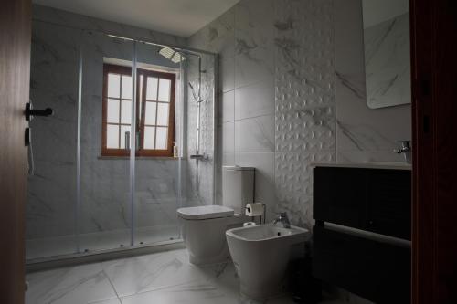 Ванная комната в Casas do Oiteirinho