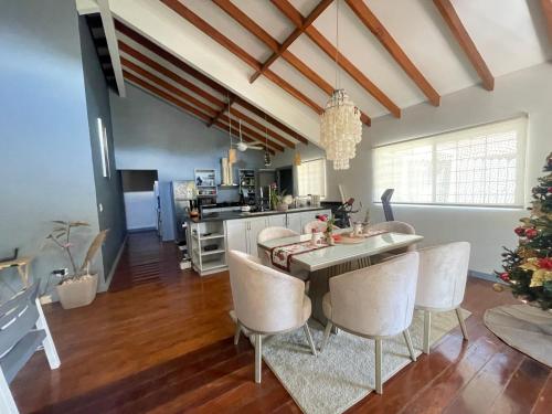 a kitchen and dining room with a table and chairs at Casa Gato in Big Creek