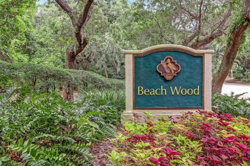 a sign for a beach wood in a garden at 2107 Beach Wood in Amelia Island