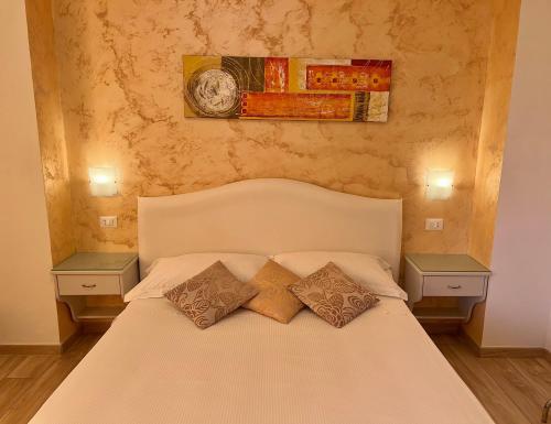 Katil atau katil-katil dalam bilik di Bella Tropea Accommodation