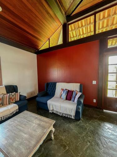 Χώρος καθιστικού στο Casa aconchegante na rua da praia