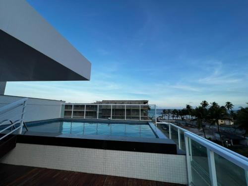 Piscina di Apartamento aconchegante de 3/4 na beira da praia! o nelle vicinanze