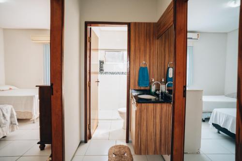 a bathroom with a sink and a toilet at Casa de Praia em Luis Correia - Piaui in Luis Correia