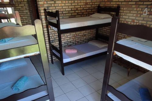 Ein Etagenbett oder Etagenbetten in einem Zimmer der Unterkunft Casa do Ric