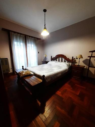 Ένα ή περισσότερα κρεβάτια σε δωμάτιο στο Casa a 2 cuadras de la playa