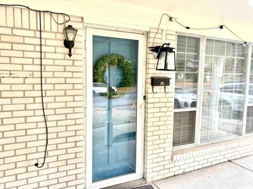 a door to a house with a glass door at Welcome travel workers, King bed, 2br 1 ,5 ba, 4beds sleep 5, Valero, Blue oval in Memphis