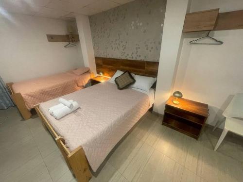 Posteľ alebo postele v izbe v ubytovaní Huancayo Suite 2-Cómodo miniDpto