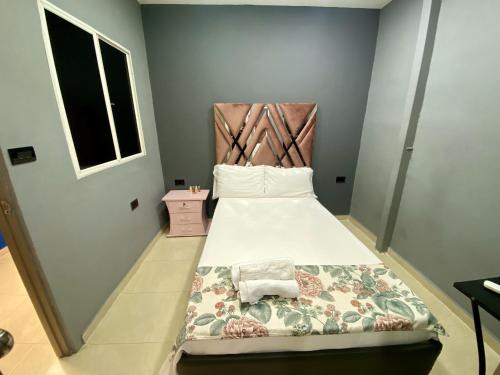 Una cama o camas en una habitación de Casa Mango