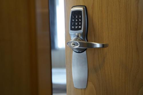 a close up of a door with a remote control at Vogahraun 4 in Myvatn