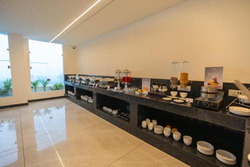 a room with a buffet of food on display at Clarks inn Express Ayodhya in Ayodhya