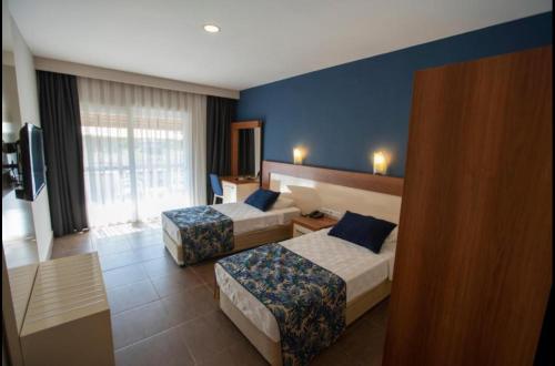 Letto o letti in una camera di MIR'AMOR GARDEN Resort Hotel-ALL INCLUSIVE