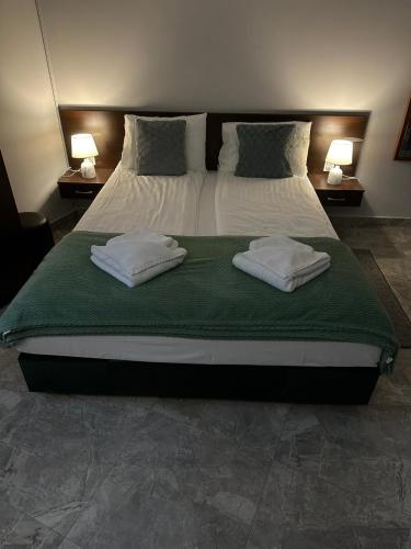 Cama o camas de una habitación en Fenix Apartments
