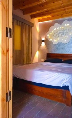 a bedroom with a large bed in a room at Cozy Studio in Asala of Dahab1 in Dahab