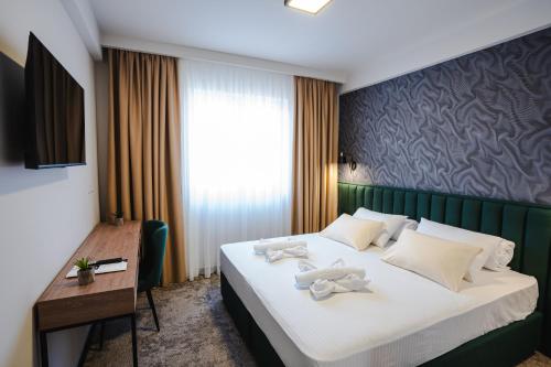 Postel nebo postele na pokoji v ubytování HOTEL NEST