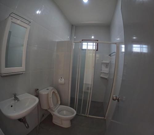 a bathroom with a shower and a toilet and a sink at Pattaya pool villa in Ban Huai Yai