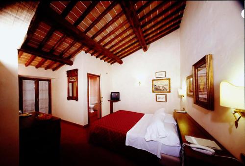 Cama o camas de una habitación en Fattoria Pianetti