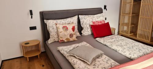 Postel nebo postele na pokoji v ubytování Haus MUMO