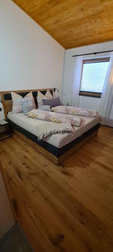 Postel nebo postele na pokoji v ubytování Haus MUMO