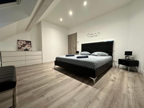 Ένα ή περισσότερα κρεβάτια σε δωμάτιο στο Comme a la maison 6