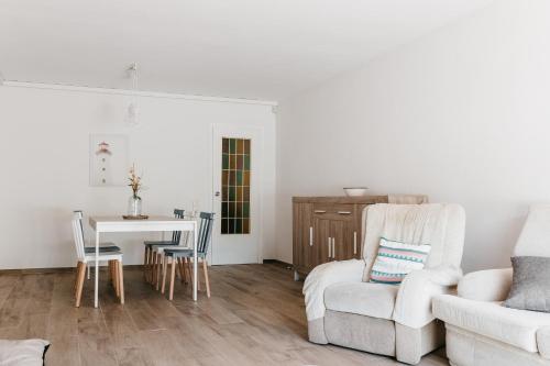 Posezení v ubytování Hauzify I Apartament Arroyo