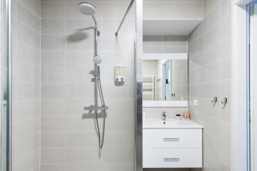 a bathroom with a shower and a sink at Luxury apartment - Sea View - Private parking in Beausoleil