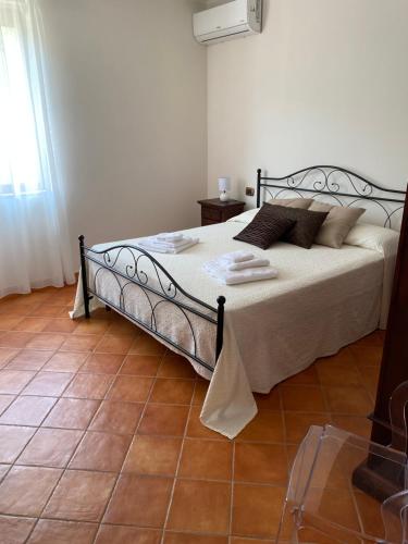 Posteľ alebo postele v izbe v ubytovaní Baglio Quadrone monte suso
