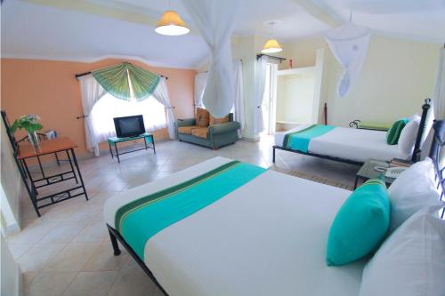 Una cama o camas en una habitación de Lukenya Getaway