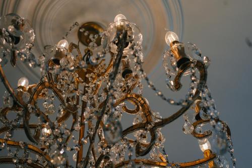 a close up of a chandelier at 40Winks in Durham