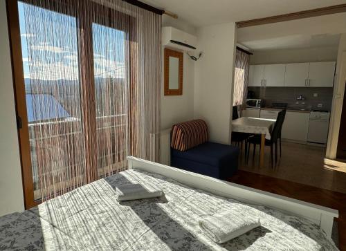 Posteľ alebo postele v izbe v ubytovaní Guest House Aurora
