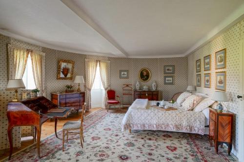 Ένα ή περισσότερα κρεβάτια σε δωμάτιο στο Château de Thouaré