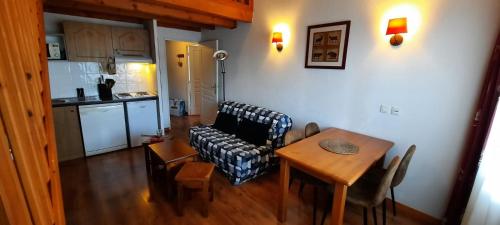 Køkken eller tekøkken på Duplex-Chalet entre Lac et Montagne avec Balcon