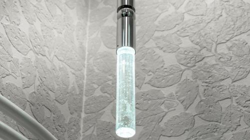 a glass shower door with a light on it at Avlabari district Premium Apartments in Tbilisi City